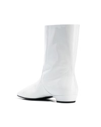 Белые кожаные ботильоны от Miu Miu