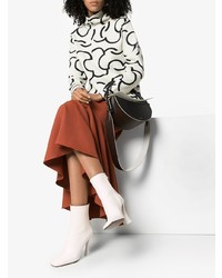 Белые кожаные ботильоны от Neous