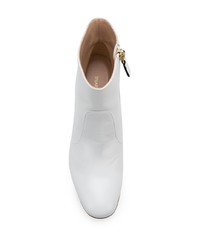 Белые кожаные ботильоны от Stuart Weitzman