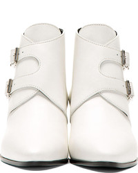 Белые кожаные ботильоны от Saint Laurent