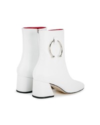 Белые кожаные ботильоны от Dorateymur
