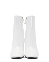 Белые кожаные ботильоны от Prada