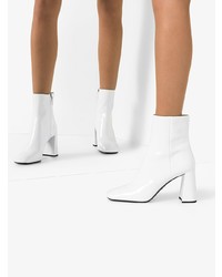 Белые кожаные ботильоны от Prada