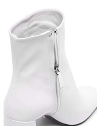 Белые кожаные ботильоны от Prada