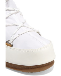 Женские белые кожаные ботинки от Moon Boot