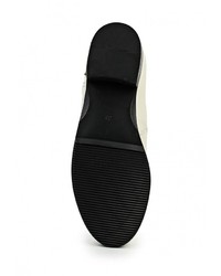 Белые кожаные ботфорты от Inario