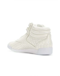 Женские белые кожаные высокие кеды от Reebok