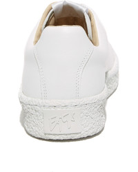 Женские белые кожаные кеды от Eytys