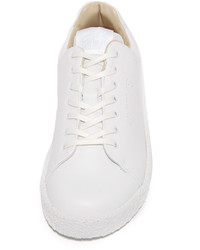 Женские белые кожаные кеды от Eytys