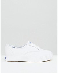 Женские белые кожаные кеды от Keds