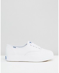 Женские белые кожаные кеды от Keds