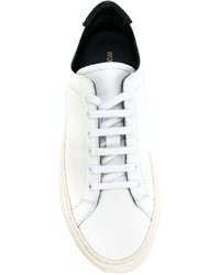 Женские белые кожаные кеды от Common Projects