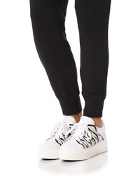 Женские белые кожаные кеды от Kenzo