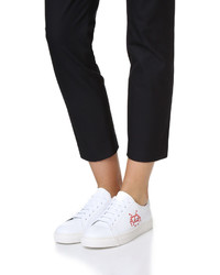 Женские белые кожаные кеды от Anya Hindmarch