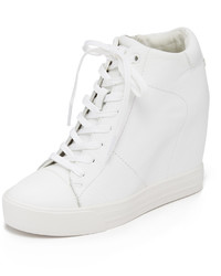 Белые кожаные кроссовки на танкетке от DKNY