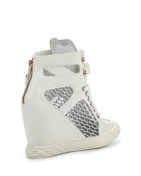 Белые кожаные кроссовки на танкетке от Guapissima