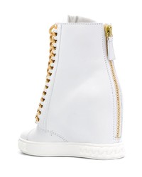 Белые кожаные кроссовки на танкетке от Casadei