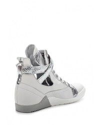 Белые кожаные кроссовки на танкетке от Khrio