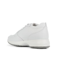 Белые кожаные кроссовки на танкетке от Hogan