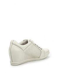 Белые кожаные кроссовки на танкетке от Spur