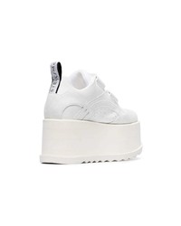 Белые кожаные кроссовки на танкетке от Stella McCartney