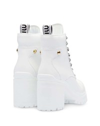 Белые кожаные массивные ботильоны на шнуровке от Miu Miu