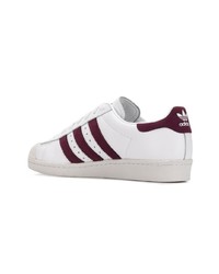 Мужские белые кожаные низкие кеды с принтом от adidas