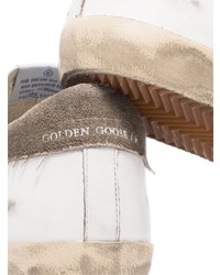 Мужские белые кожаные низкие кеды со звездами от Golden Goose