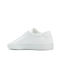 Мужские белые кожаные низкие кеды от Common Projects