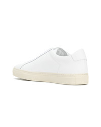 Мужские белые кожаные низкие кеды от Common Projects