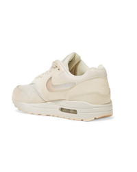 Женские белые кожаные низкие кеды от Nike