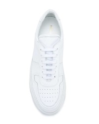 Женские белые кожаные низкие кеды от Common Projects