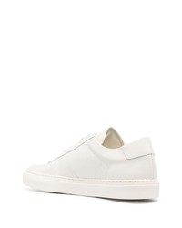 Мужские белые кожаные низкие кеды от Common Projects