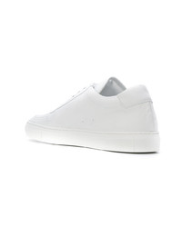 Мужские белые кожаные низкие кеды от Common Projects