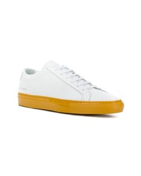 Мужские белые кожаные низкие кеды от Common Projects