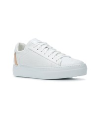 Женские белые кожаные низкие кеды от Fabi