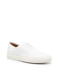 Мужские белые кожаные низкие кеды от Common Projects