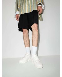 Мужские белые кожаные низкие кеды от Raf Simons