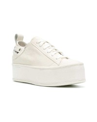 Женские белые кожаные низкие кеды от Diesel