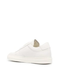 Мужские белые кожаные низкие кеды от Common Projects