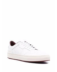 Мужские белые кожаные низкие кеды от Common Projects