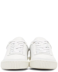 Женские белые кожаные низкие кеды от Courreges