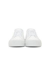 Женские белые кожаные низкие кеды от Woman by Common Projects