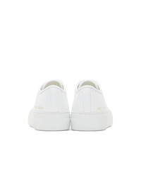 Женские белые кожаные низкие кеды от Woman by Common Projects