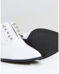 Белые кожаные сабо от Sol Sana