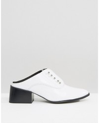 Белые кожаные сабо от Sol Sana