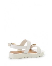Белые кожаные сандалии на плоской подошве от Aldo