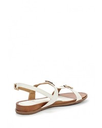 Белые кожаные сандалии на плоской подошве от Amazonga