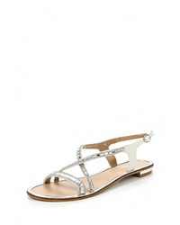 Белые кожаные сандалии на плоской подошве от Amazonga