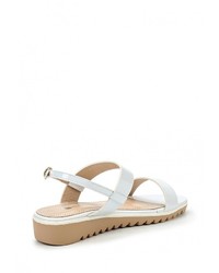 Белые кожаные сандалии на плоской подошве от Amazonga